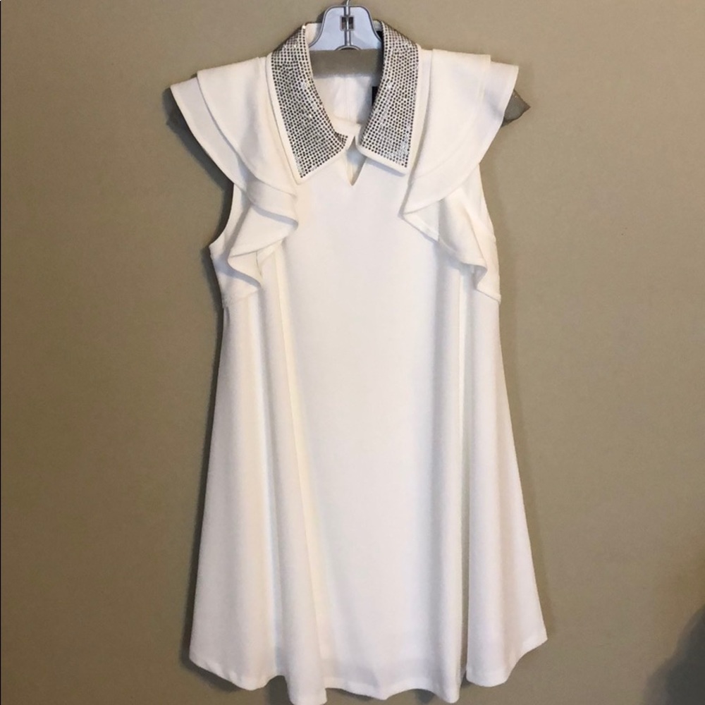 Fabulous white dress with rhinestone collar.